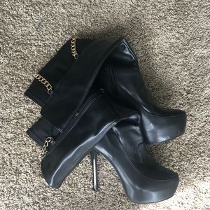 Black knee high heel boots w/ gold chains